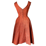 Burnt orange and gold brocade 1950s cocktail gown with button trimmed bodice