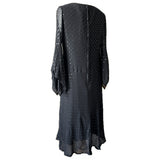 Sultry vintage late 1960s black glitter dot chiffon dress with dramatic flared sleeves