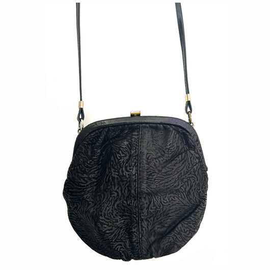 Black embossed leather cross-body 1980s shoulder bag