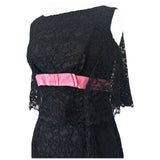 Black lace 1960s cocktail dress with pink ribbon trim and cape back