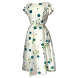 Vintage 1950s white nylon dress with flocked teal roses